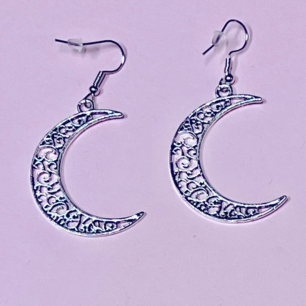 Ornate moon dangle earrings
